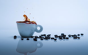 white ceramic cup with coffee beans HD wallpaper